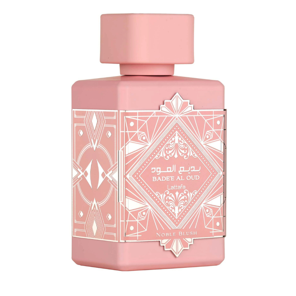 Pink perfume bottle with geometric design on a white background