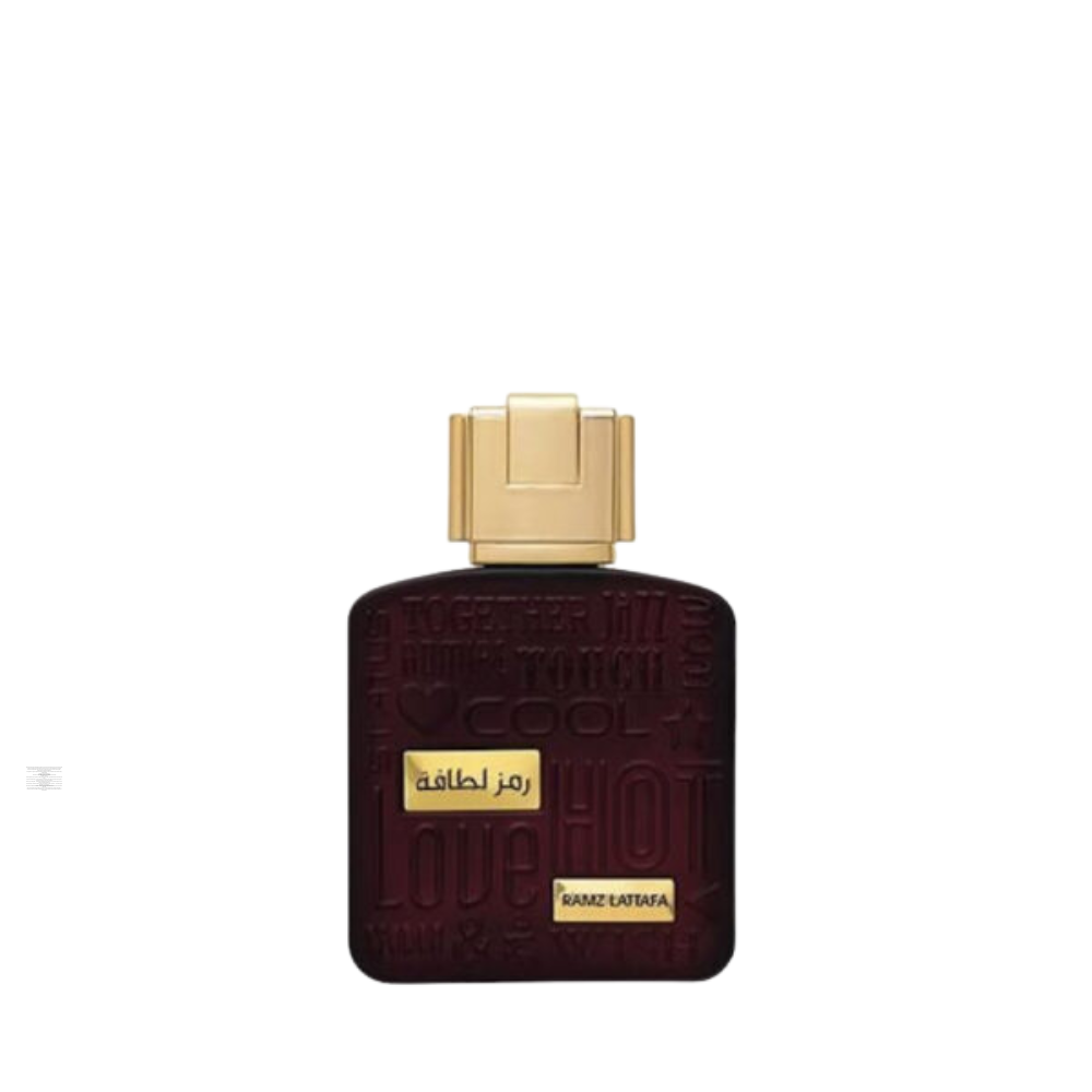 Lattafa Ramz Gold 100ml perfume bottle with gold detailing.
