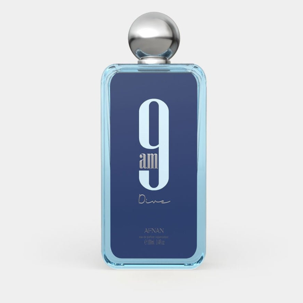 Perfume bottle with blue label and silver cap on a white background