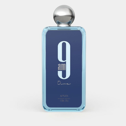Perfume bottle with blue label and silver cap on a white background