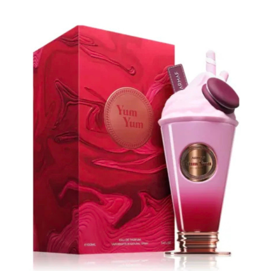 Pink and red Yum Yum themed perfume bottle and packaging on a white background