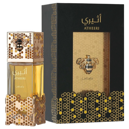 Atheeri perfume bottle and packaging with bee and honeycomb design on a white background