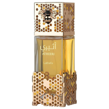 Perfume bottle with honeycomb design and bee emblem on a white background