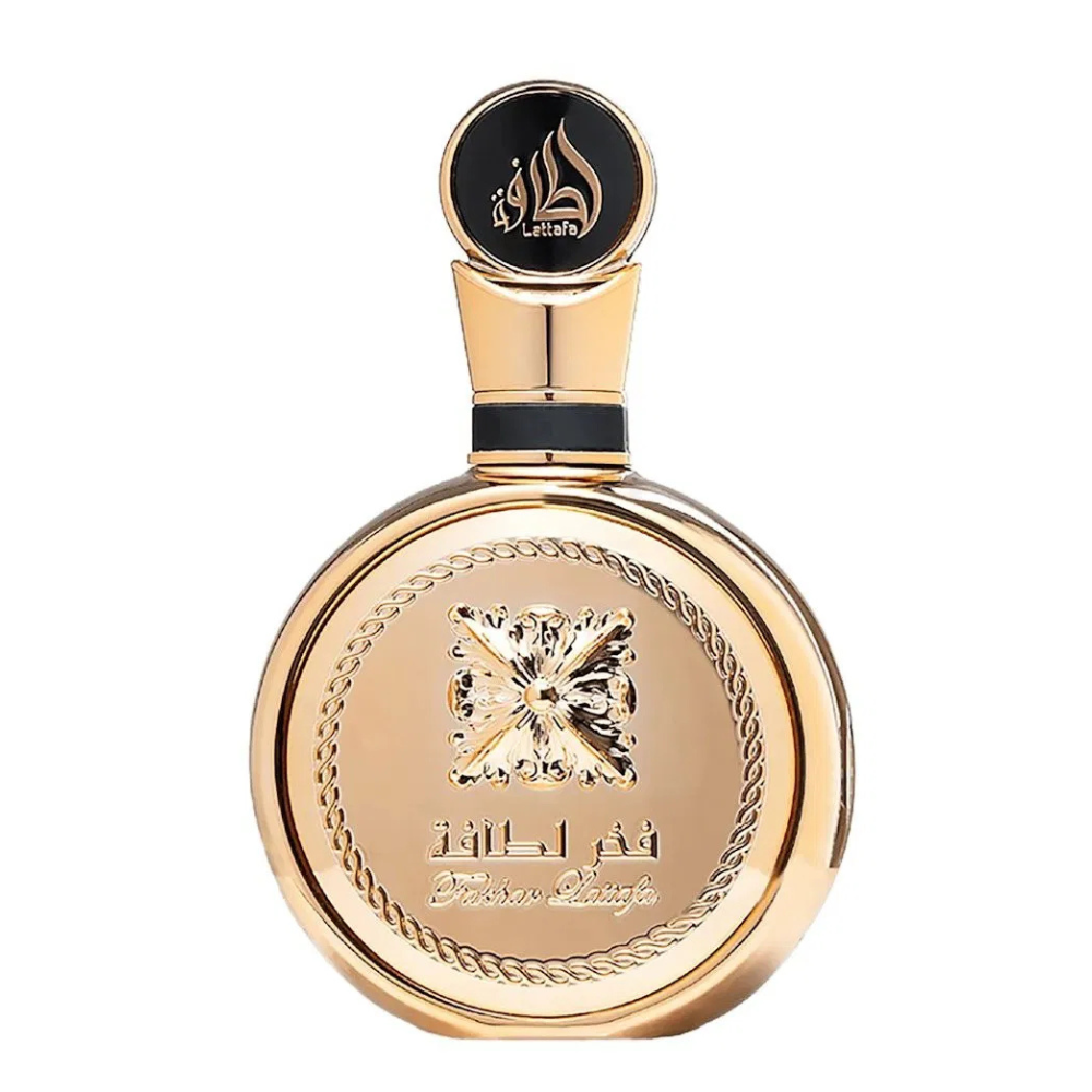 Gold perfume bottle with decorative design on a white background