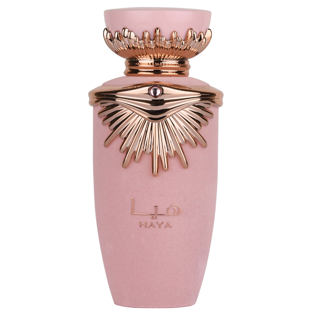 Pink perfume bottle with gold accents on a white background