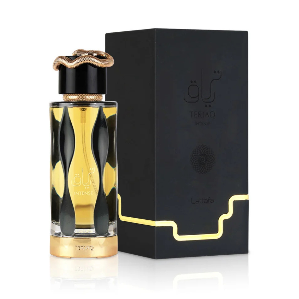 Perfume bottle with gold and black design next to its packaging on a white background