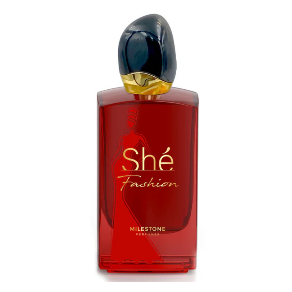 Red perfume bottle labeled 'Shé Fashion' on a white background