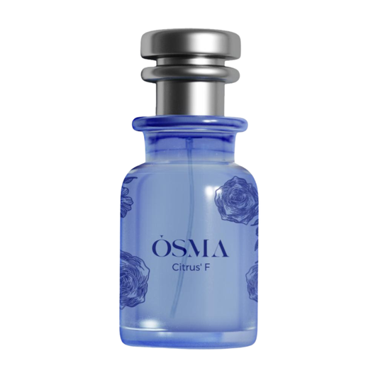 Blue perfume bottle with silver cap on a white background
