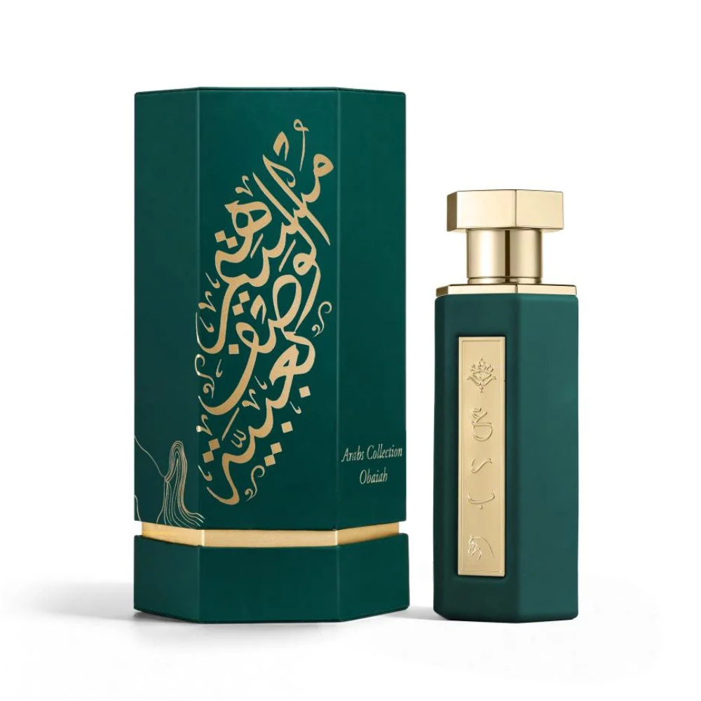 Green perfume bottle and packaging with gold accents on a white background