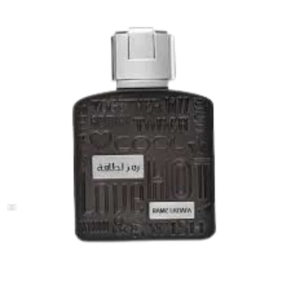 Lattafa Ramz 100ml perfume bottle gold design on white background.